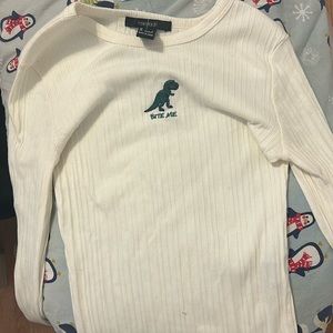 A cute long sleeve with dinosaur that says bite me